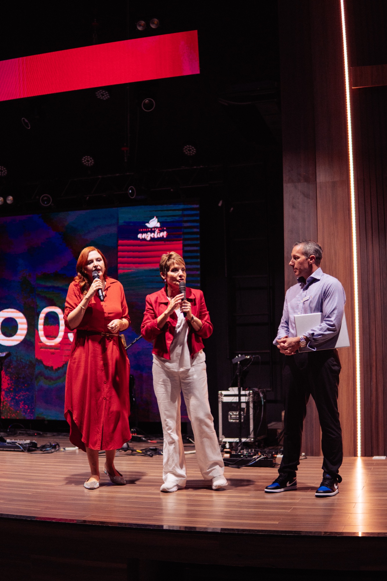Leaders ministering together on stage